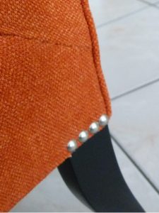 Chauffeuse boutonnée orange Casamance